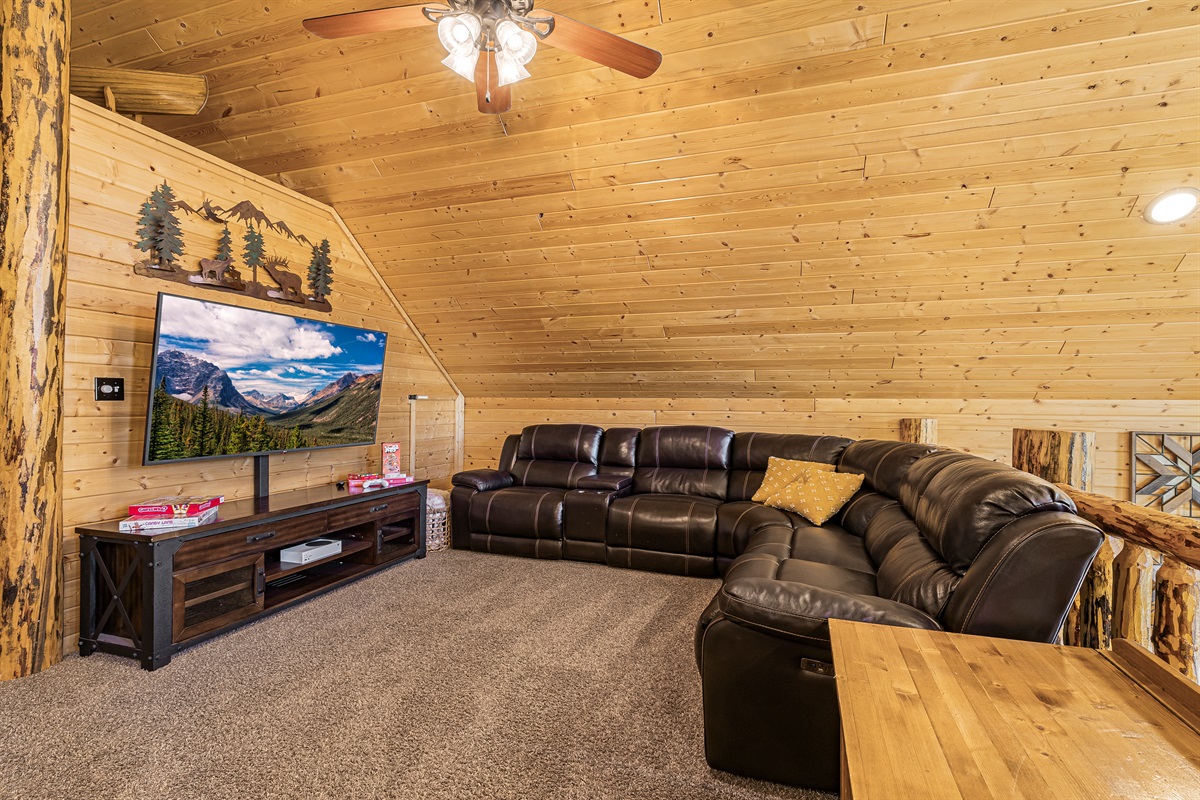 Upstairs loft area - amazing sectional couch and game area!