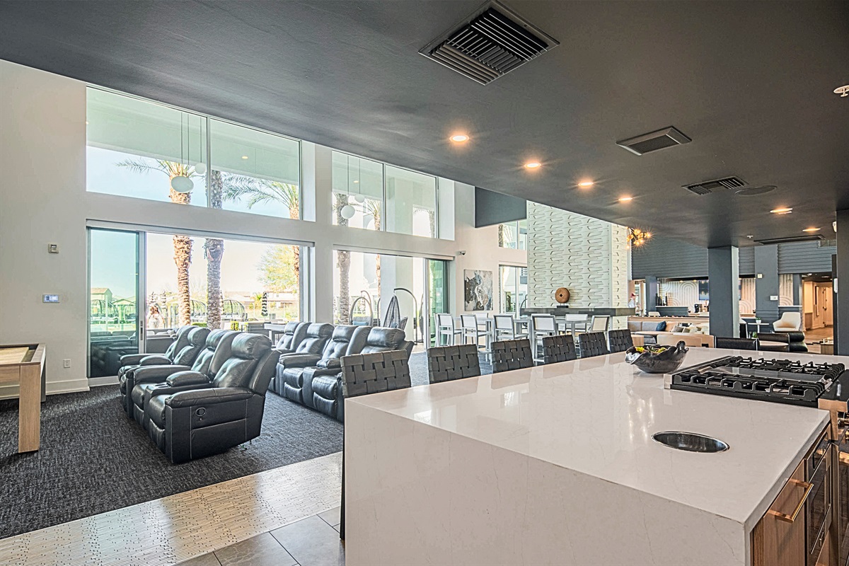 Luxe cinema lounge with plush recliners.