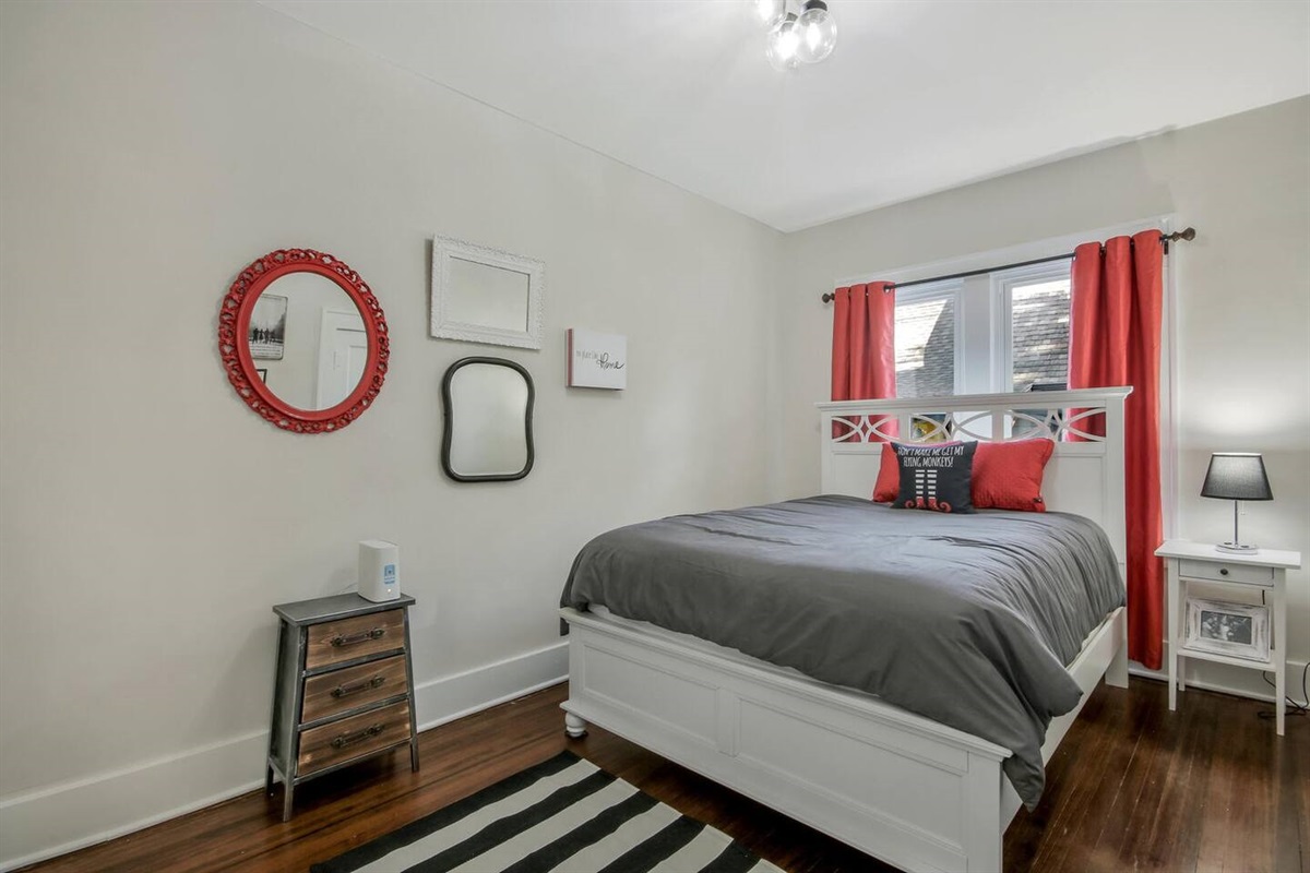 Welcome to the ruby slippers room!  Main floor room features a queen bed and a ROKU smart TV.