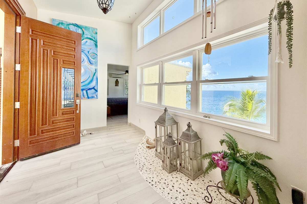 When you enter the door and head to the left, you will find the first primary suite.