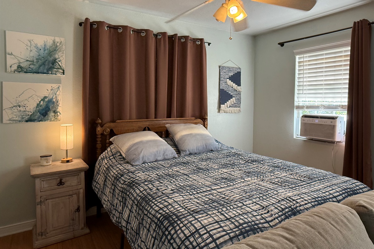 Plush queen bed with premium linens.