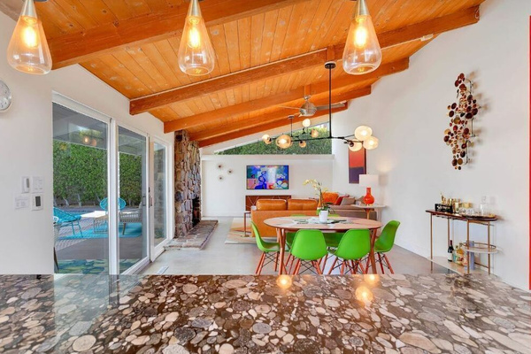 Great room with polished concrete floors and a gas fireplace