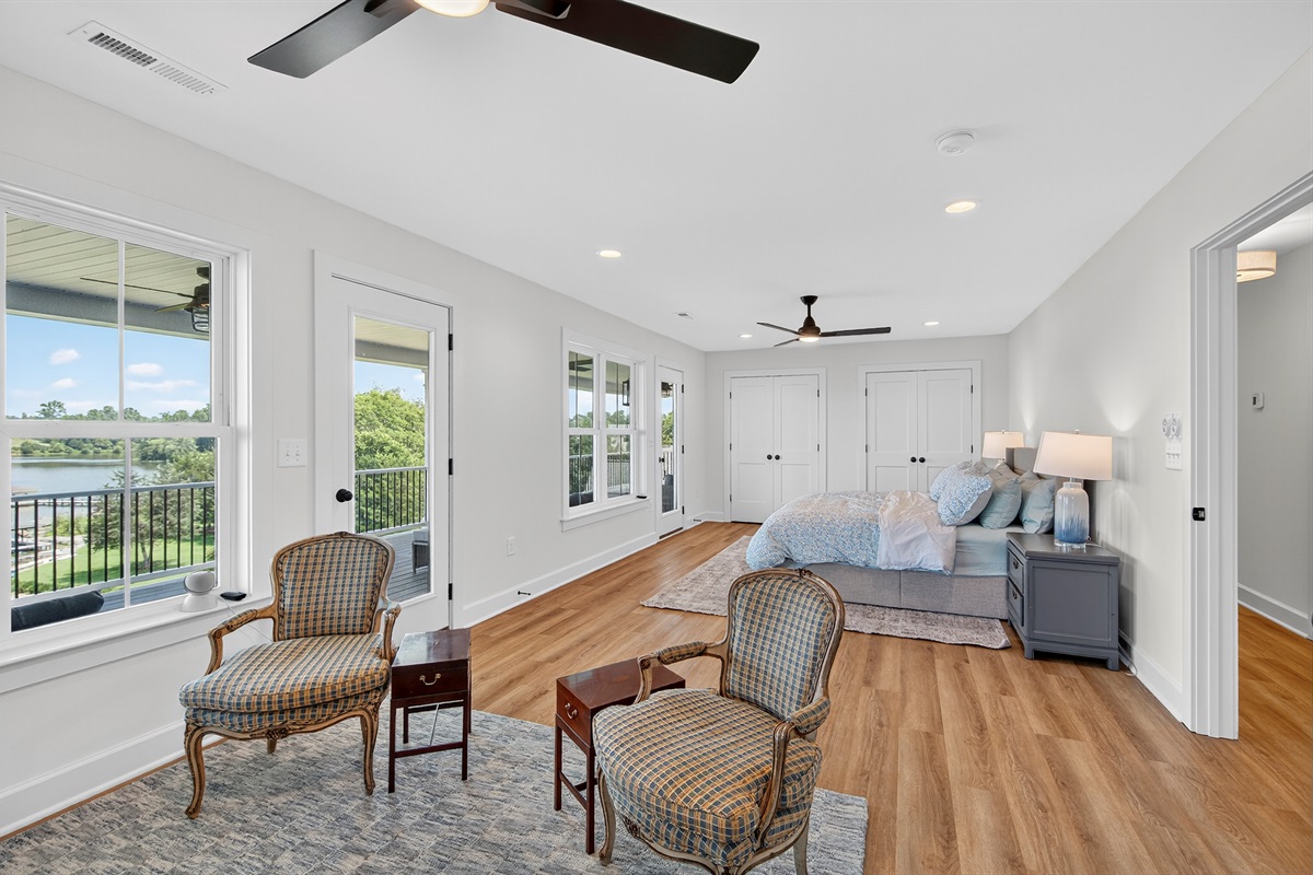 This king suite is perfect for wellness and rest. This room features a Peloton bike, ensuite bathroom, and porch access for morning inspiration.