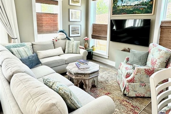 Mounted TVs in living space and all 3 bedrooms