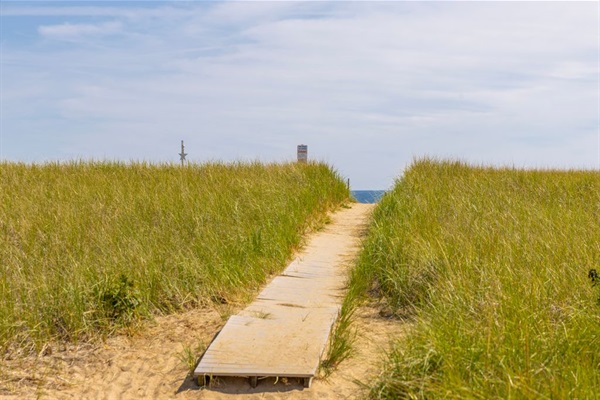 Steps away from the sparkling sea.