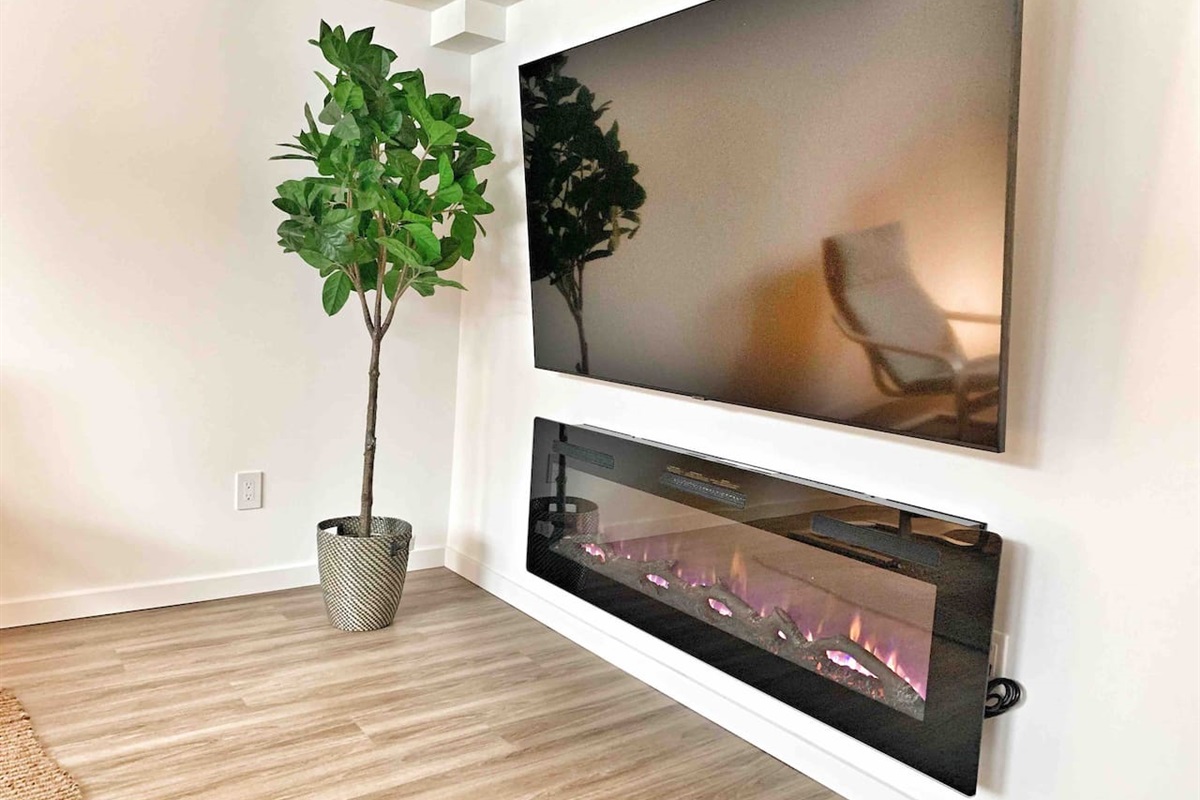 70” HD Smart TV and 60” electric fireplace