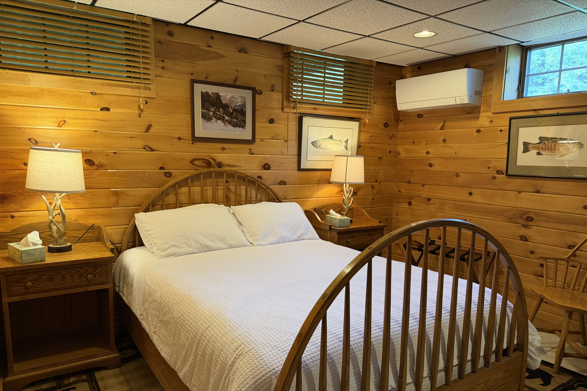 Queen bed in lower level living area