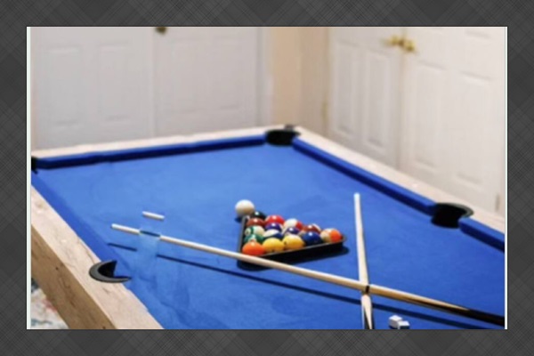 Game Room with Pool table, foosball & TV