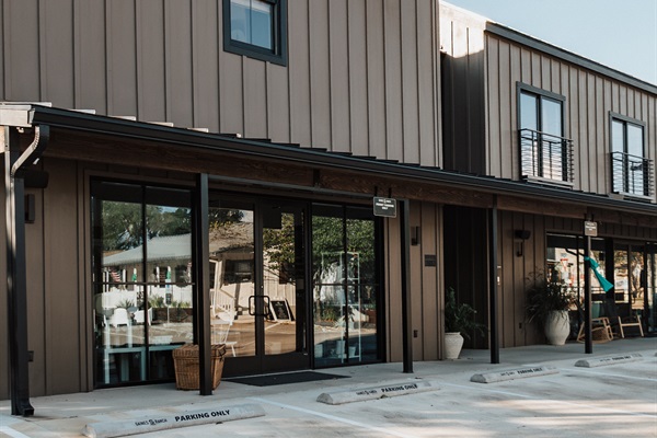On-site parking at Gaines Ranch on the Square &mdash; dedicated spaces for the entire group, with smart-lock self check-in at every suite. No front desk, no waiting.