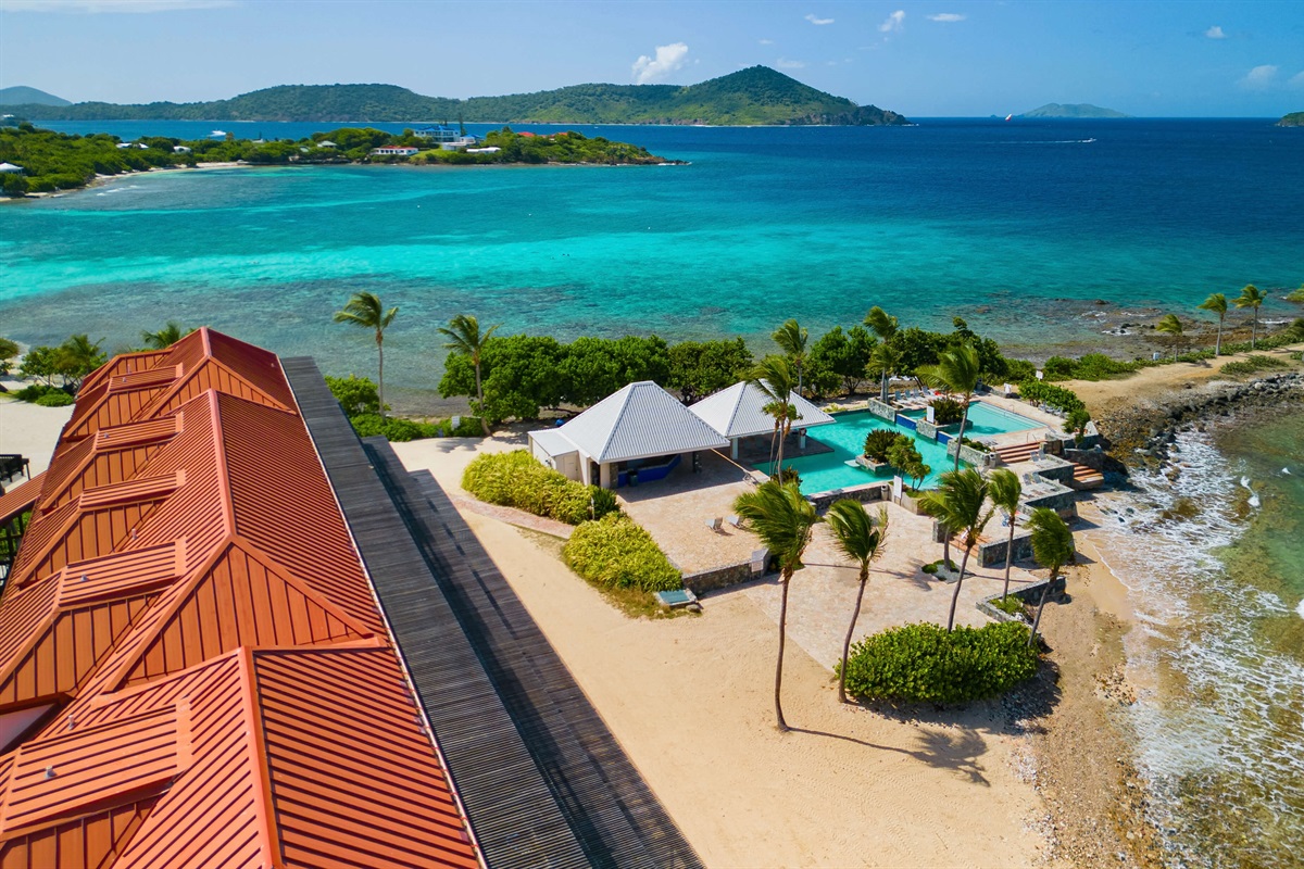 Sapphire Beach Resort's pool is nestled between the beach and the Caribbean Sea.  