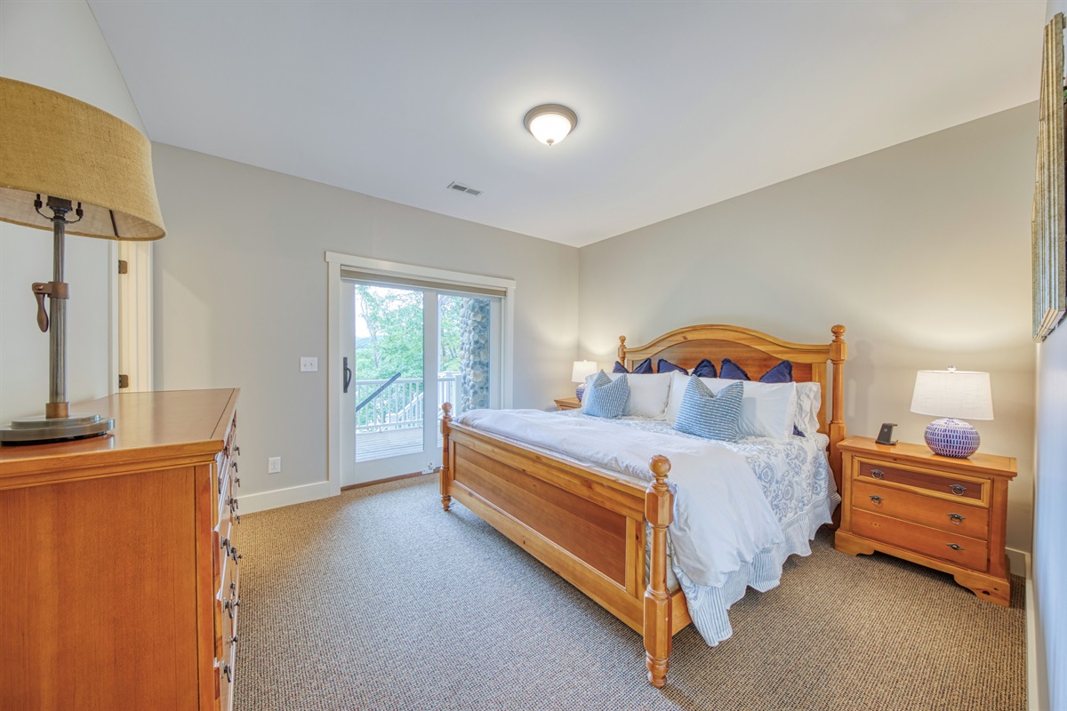 Lower Level King Bedroom With Beautiful Lake Views & Deck Access