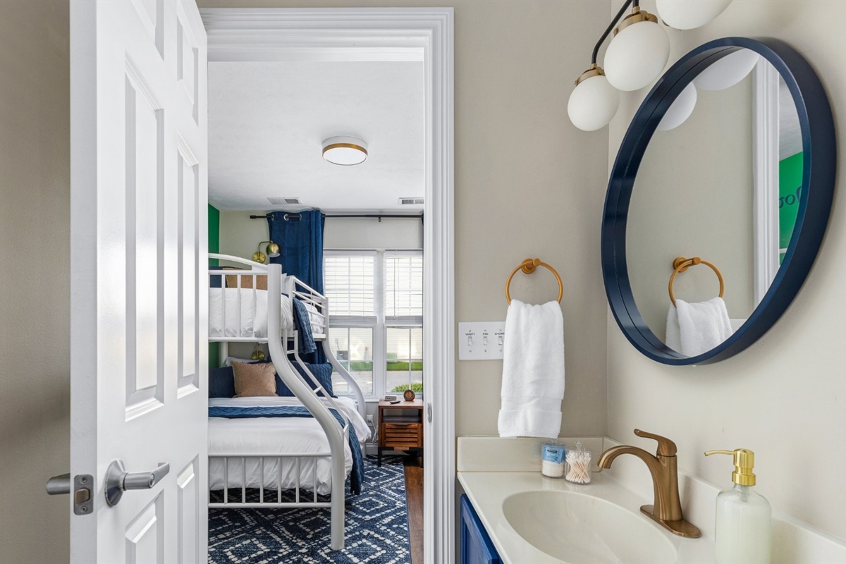 Full bathroom with shower attached to 1st floor bunk room