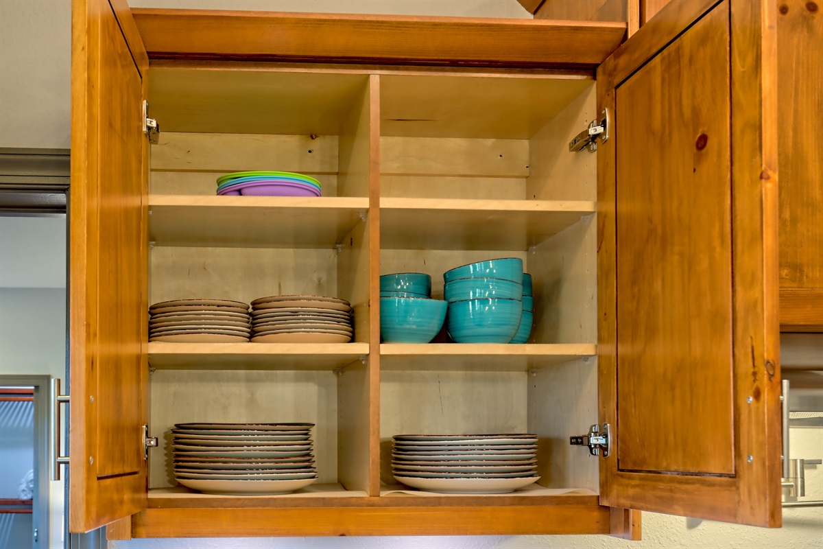 Plenty of plates, bowls, and serving pieces to accommodate large groups and family meals.