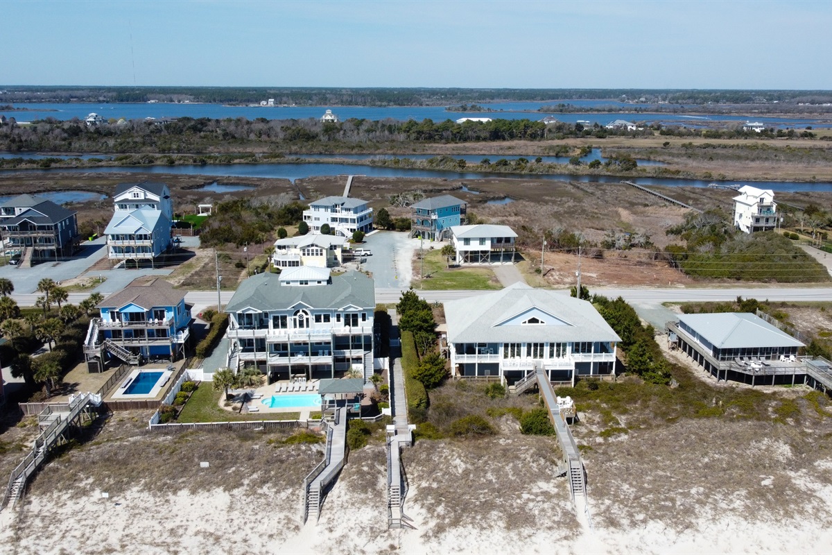 Oceanfront aerial view of Soundside Solace and surrounding homes