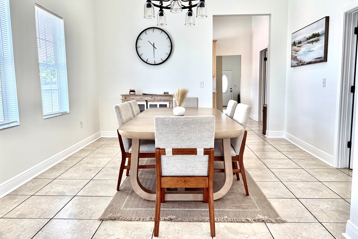 A warm, inviting dining space featuring plush seating and modern farmhouse touches for a homey feel.