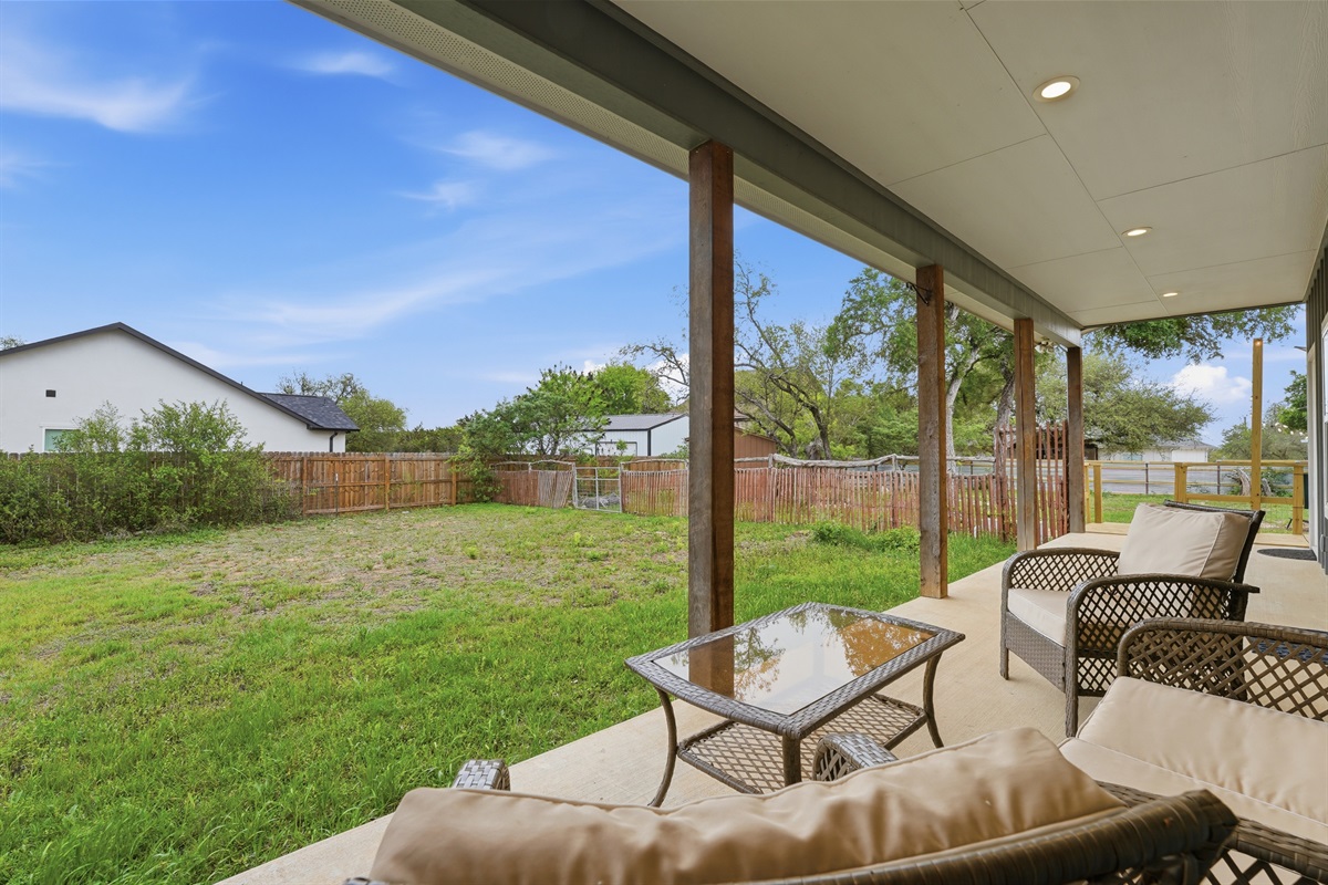 Covered porch — a quiet spot to sit, sip, and take in the Hill Country air