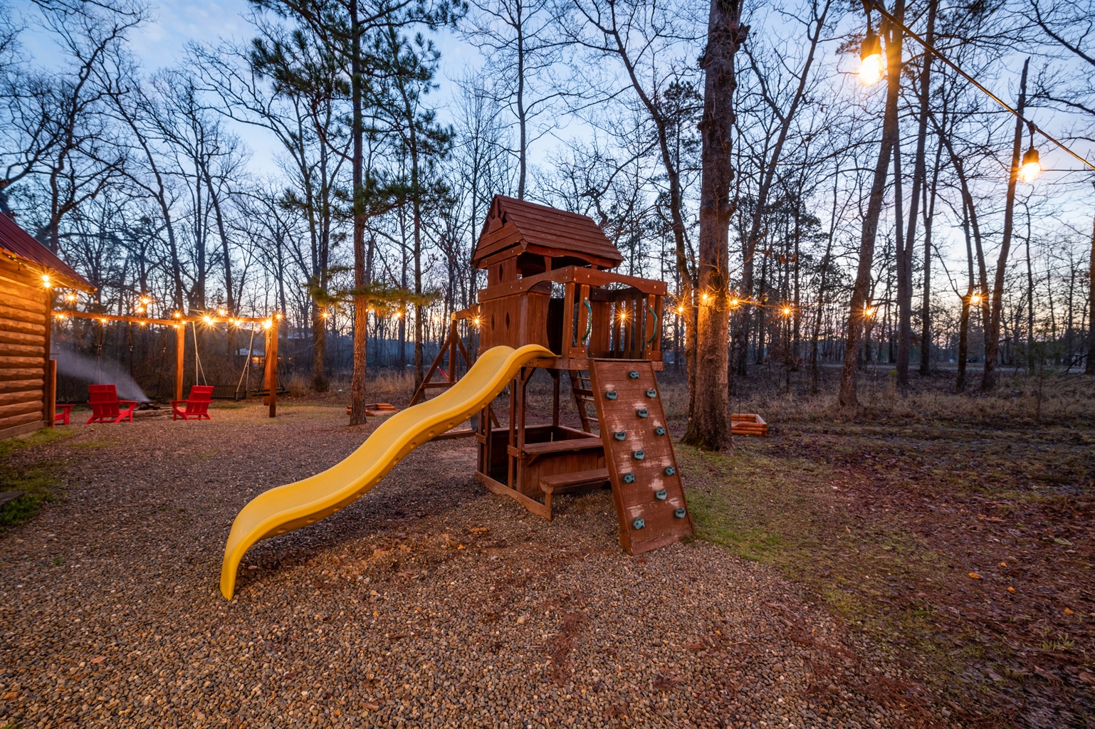 Our vibrant exterior kids slide adds a splash of excitement to your family getaway. Let the little ones laugh and play while you relax in the comfort of our charming cabin.
