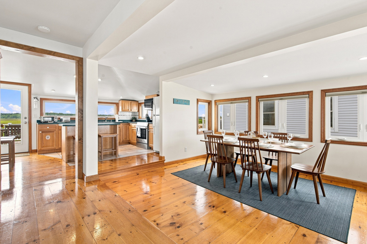 Spacious living and dining area designed for gathering with family and friends.