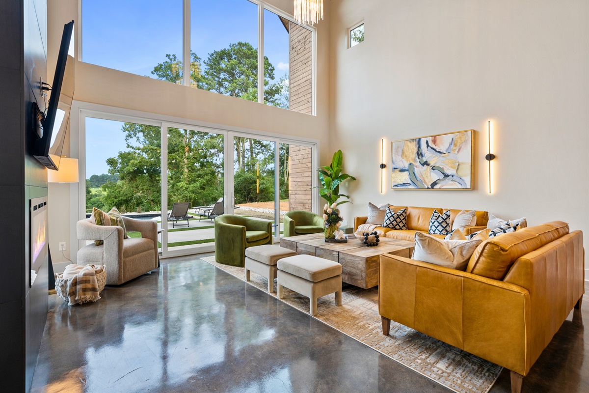 The seamless connection to the outdoors enhances the living experience, bringing nature right into your home.