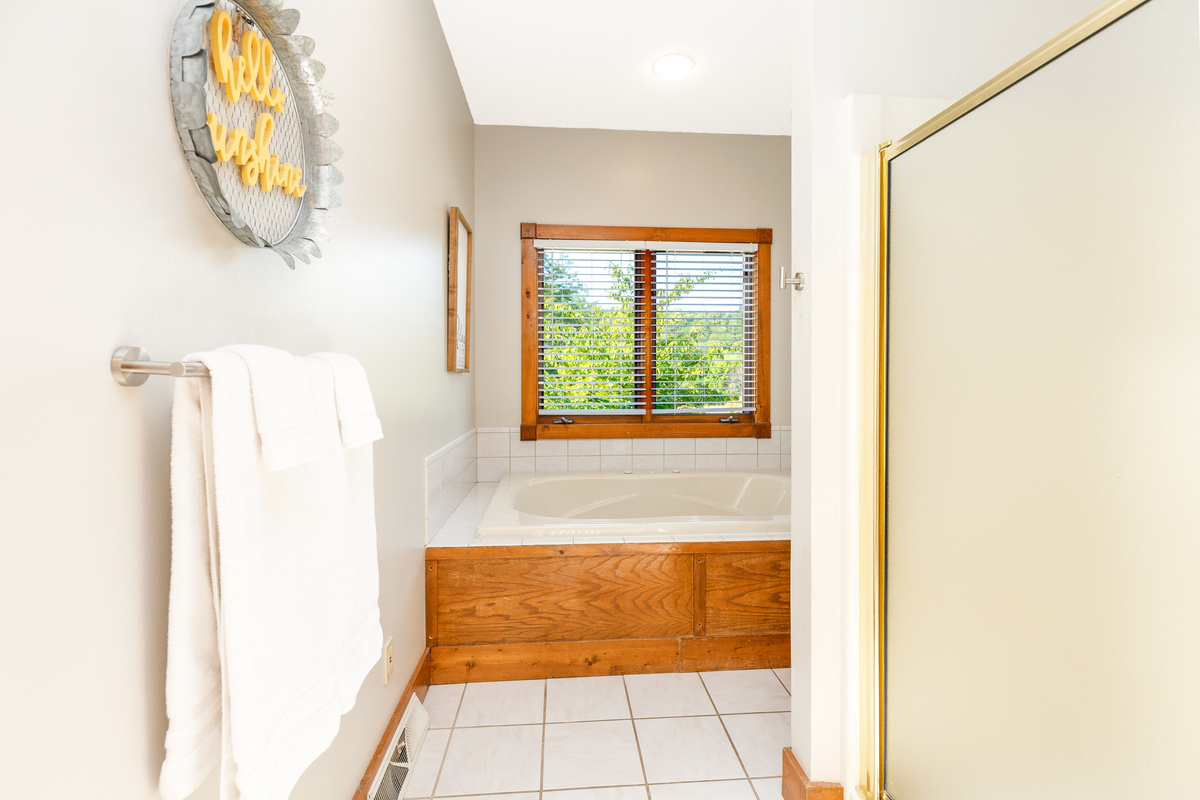 Primary Bathroom - with double vanity, shower, soaking tub