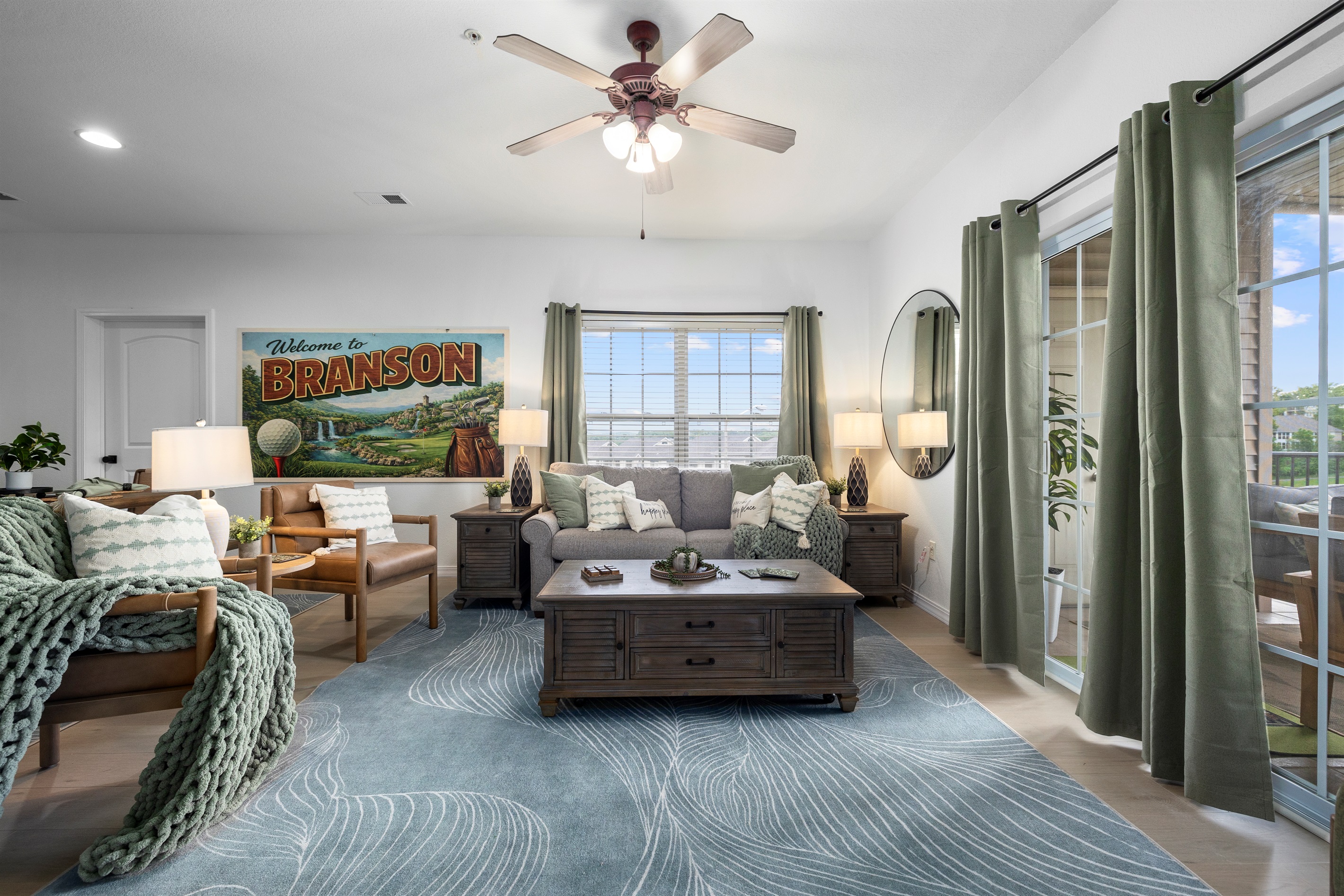 The living area is comfy and includes a queen sleeper sofa for extra sleeping area