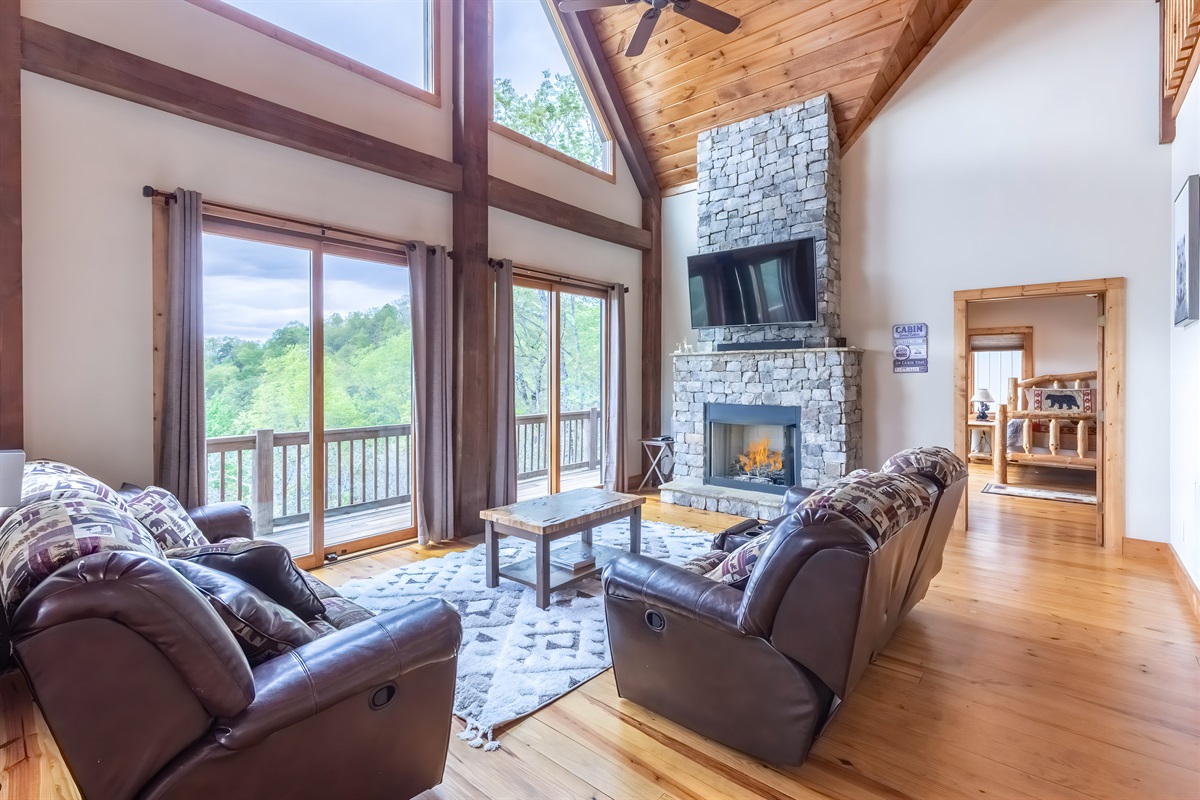 The main floor living room is spacious with plenty of windows to let in the natural light and take in the views.