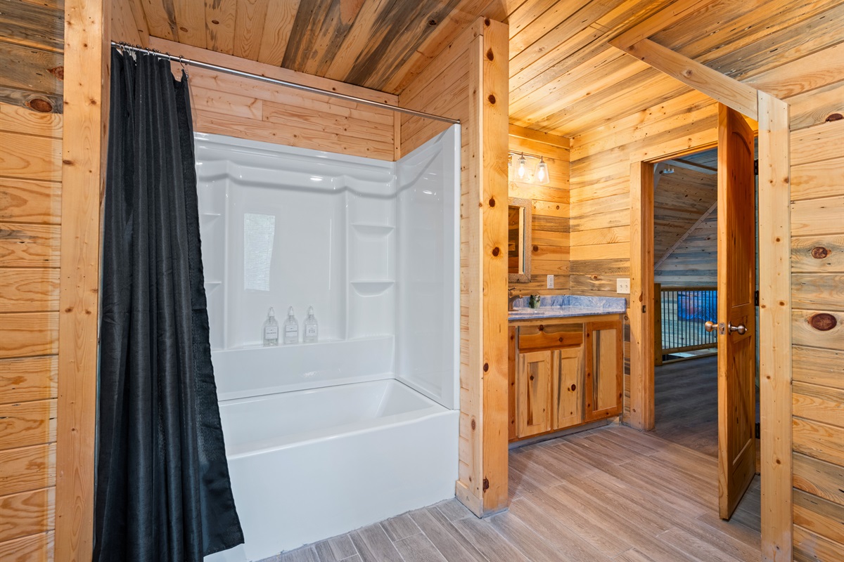 Simple and inviting, the shower tub combo offers a refreshing place to start the morning or wind down in the evening.