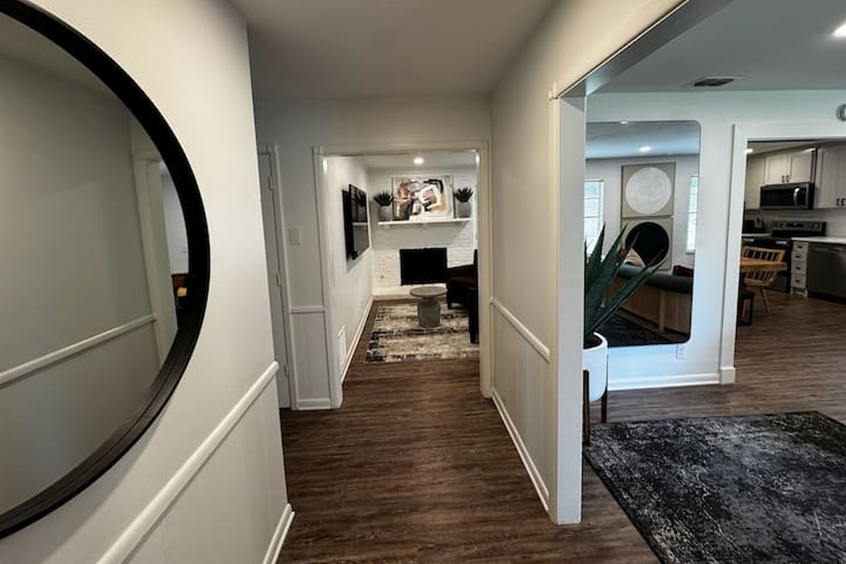 Bright entryway connecting the home’s comfortable bedrooms and shared living spaces.