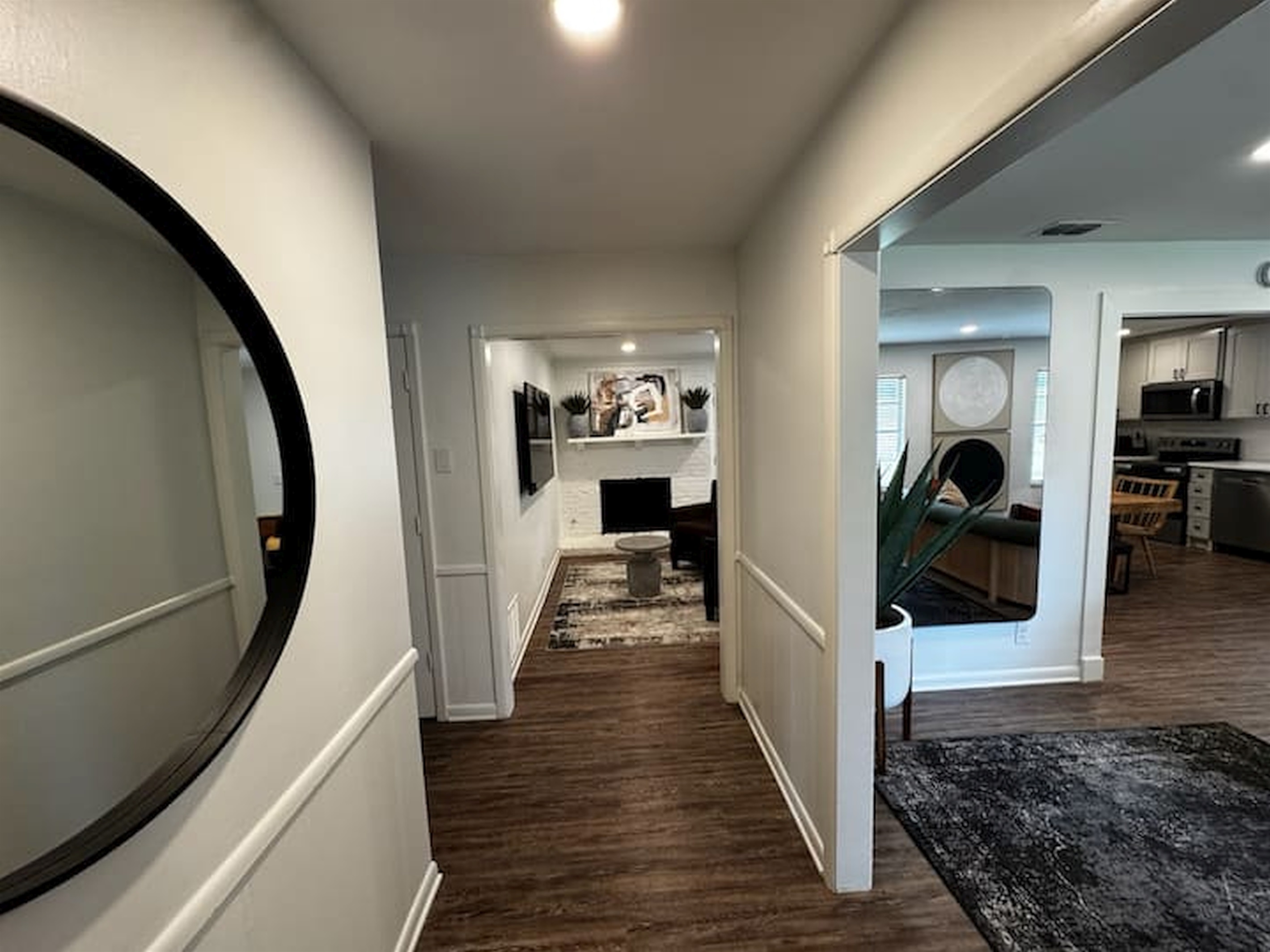 Bright entryway connecting the home’s comfortable bedrooms and shared living spaces.