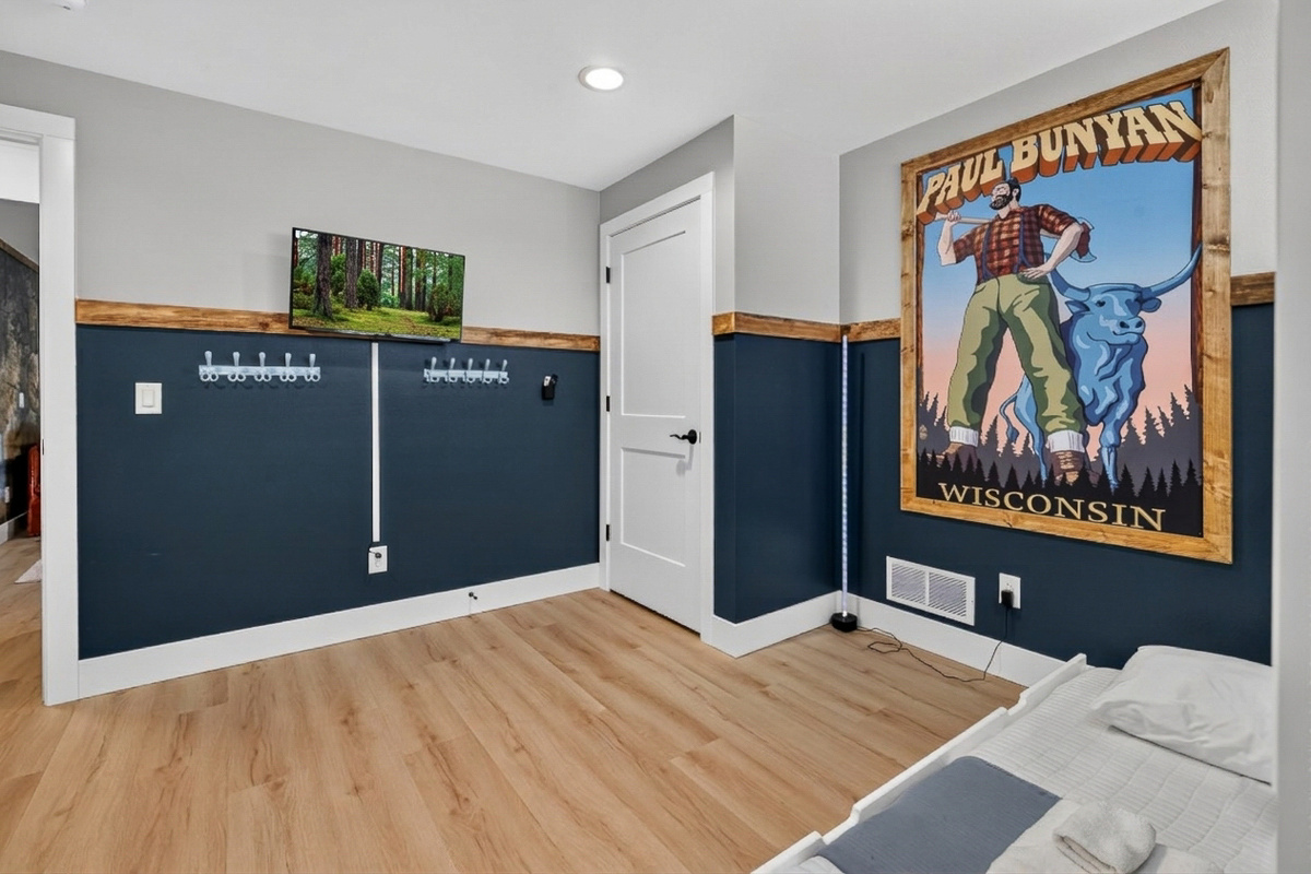 Downstairs kids bunk room that sleeps five and has a smart tv