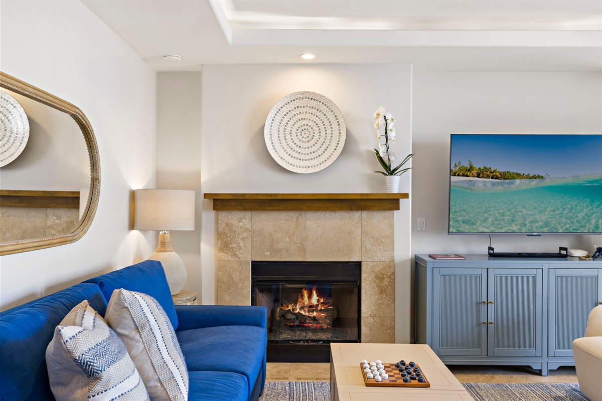 Enjoy the cozy fireplace while you watch your favorite shows on a 65" smart TV (to the left of the fireplace).  We offer Amazon Prime, Sling TV, Peacock, Hulu, Disney, Max and Paramount plus as well as over 300 movies in our amazon library.