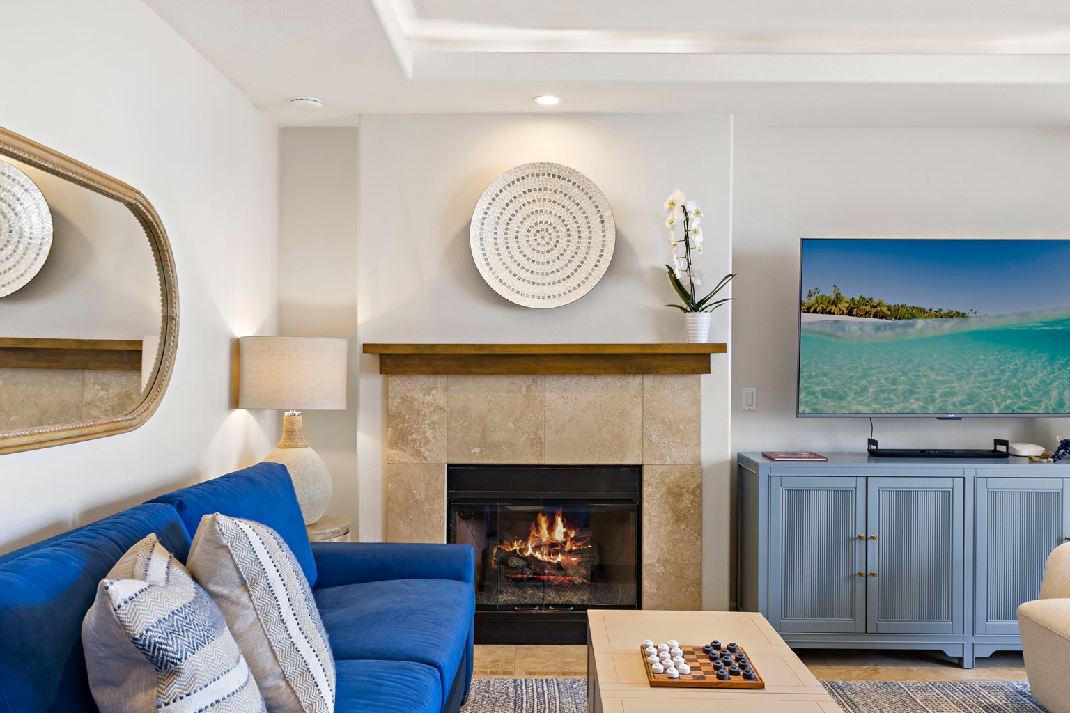 Enjoy the cozy fireplace while you watch your favorite shows on a 65" smart TV (to the left of the fireplace).  We offer Amazon Prime, Sling TV, Peacock, Hulu, Disney, Max and Paramount plus as well as over 300 movies in our amazon library.