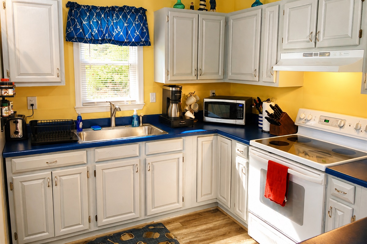 Captain's Cabin OBX — kitchen with Keurig