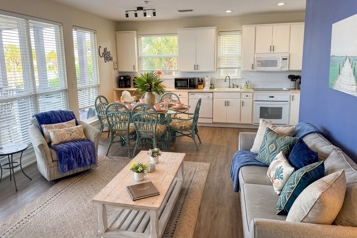 A virtual "wall of windows" offers water views from the kitchen, dining, and living areas in Margarita Villa B.