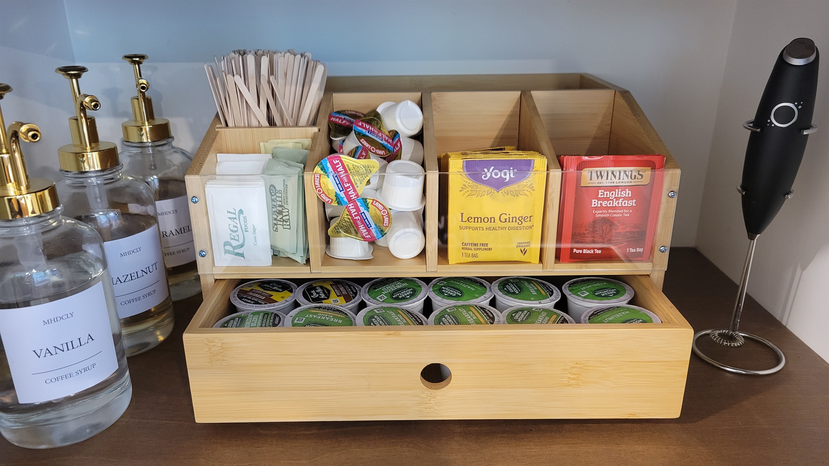 Startet set of complimentary coffee, tea, and flavored syrups, sugar and artificial sweetners.