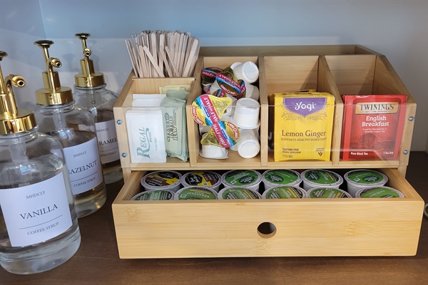 Startet set of complimentary coffee, tea, and flavored syrups, sugar and artificial sweetners.