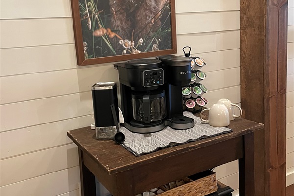 Coffee station with Keurig k-cup and drip coffee maker plus a variety of pods available.