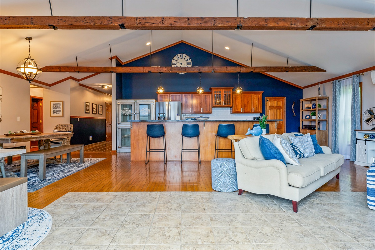 Open concept kitchen dining and living space