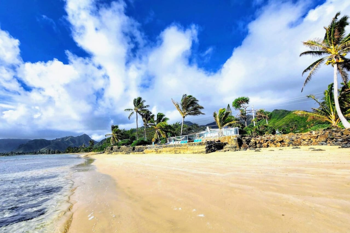 This picture was taken with a CELL PHONE and not a professional camera! Corner Beachfront Estate with its own private beach and cove.