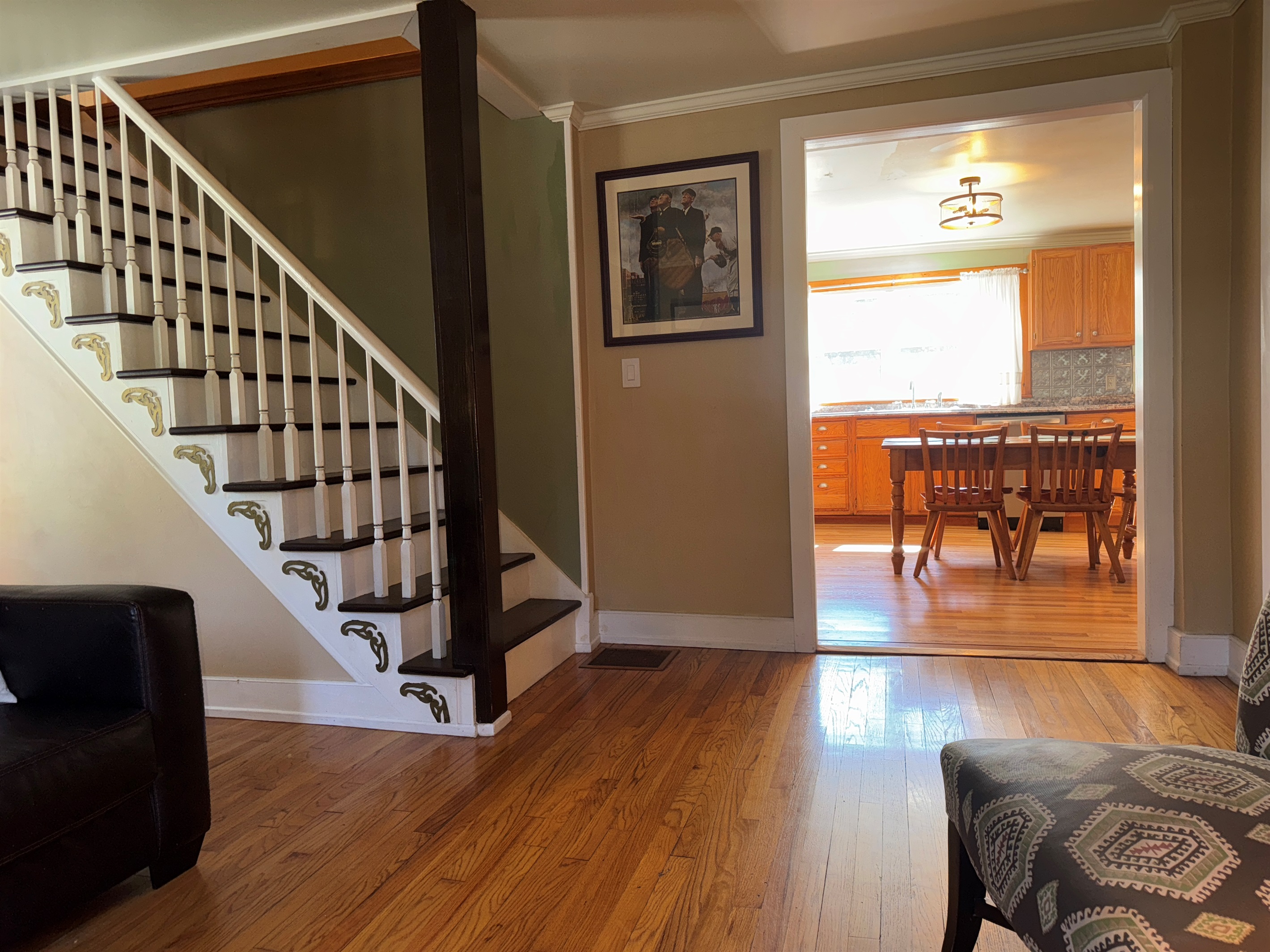Stairs to 2nd floor off kitchen and living room