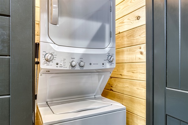 A washer and dryer are in the unit