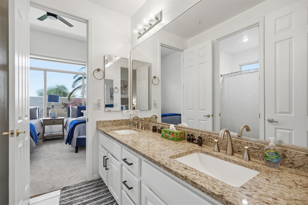 Jack N Jill bathroom is between bedrooms 2 and 3.  Offering a tub/shower combo.