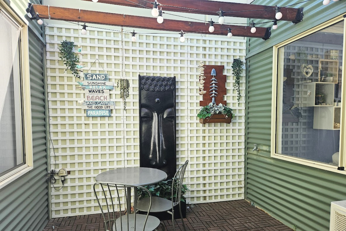 Private Courtyard, lovely in the sunshine right in the middle of the home with sliding glass door access from the hallway