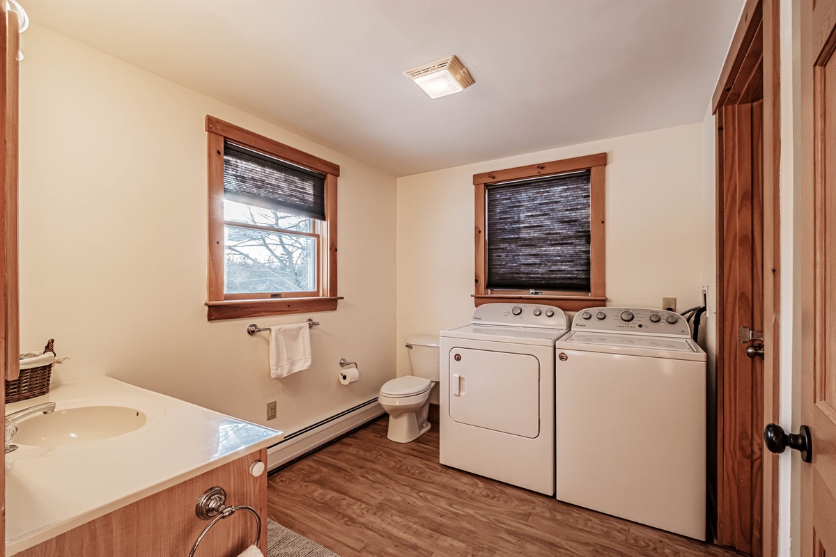 First-floor shower, toilet, and laundry area all in one convenient spot