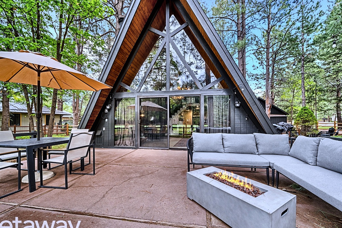 Spacious patio lounge with fire table + A-Frame views