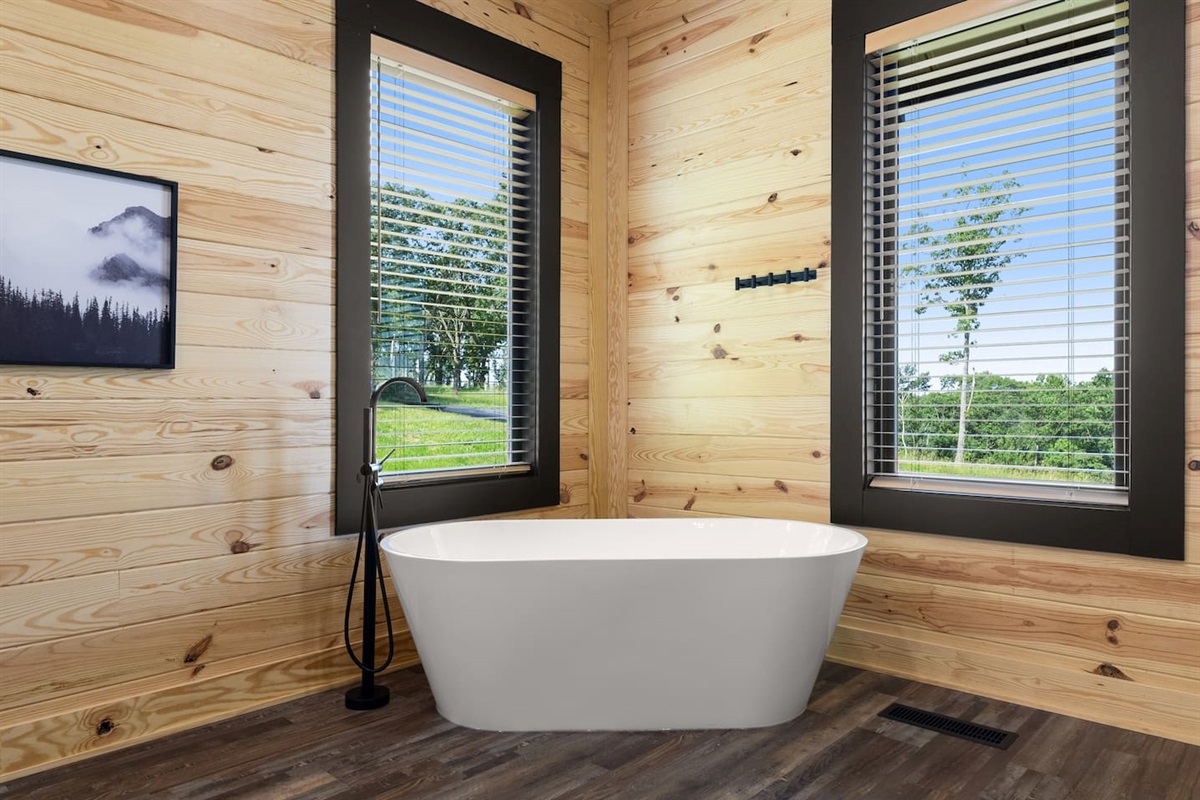 Natural light and outdoor scenery make this bathroom a refreshing escape every time you step in.
