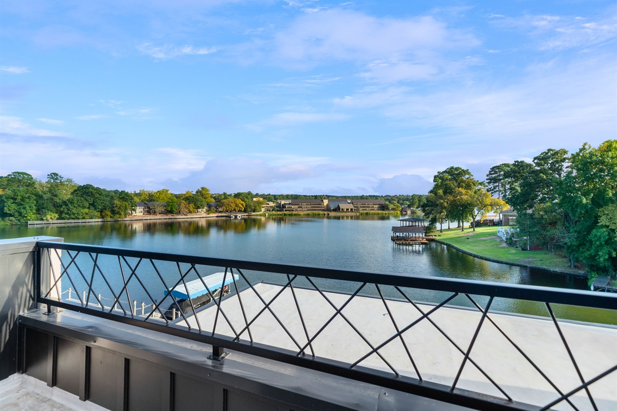 Take in the picturesque lake views from this charming balcony, where you can unwind and enjoy the serenity of the surroundings.