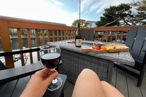 A waterfront deck, hot tub, outdoor grill and fire table provide the atmosphere. All that's missing is you and your complimentary glass of local Pinot Noir to complete the experience.