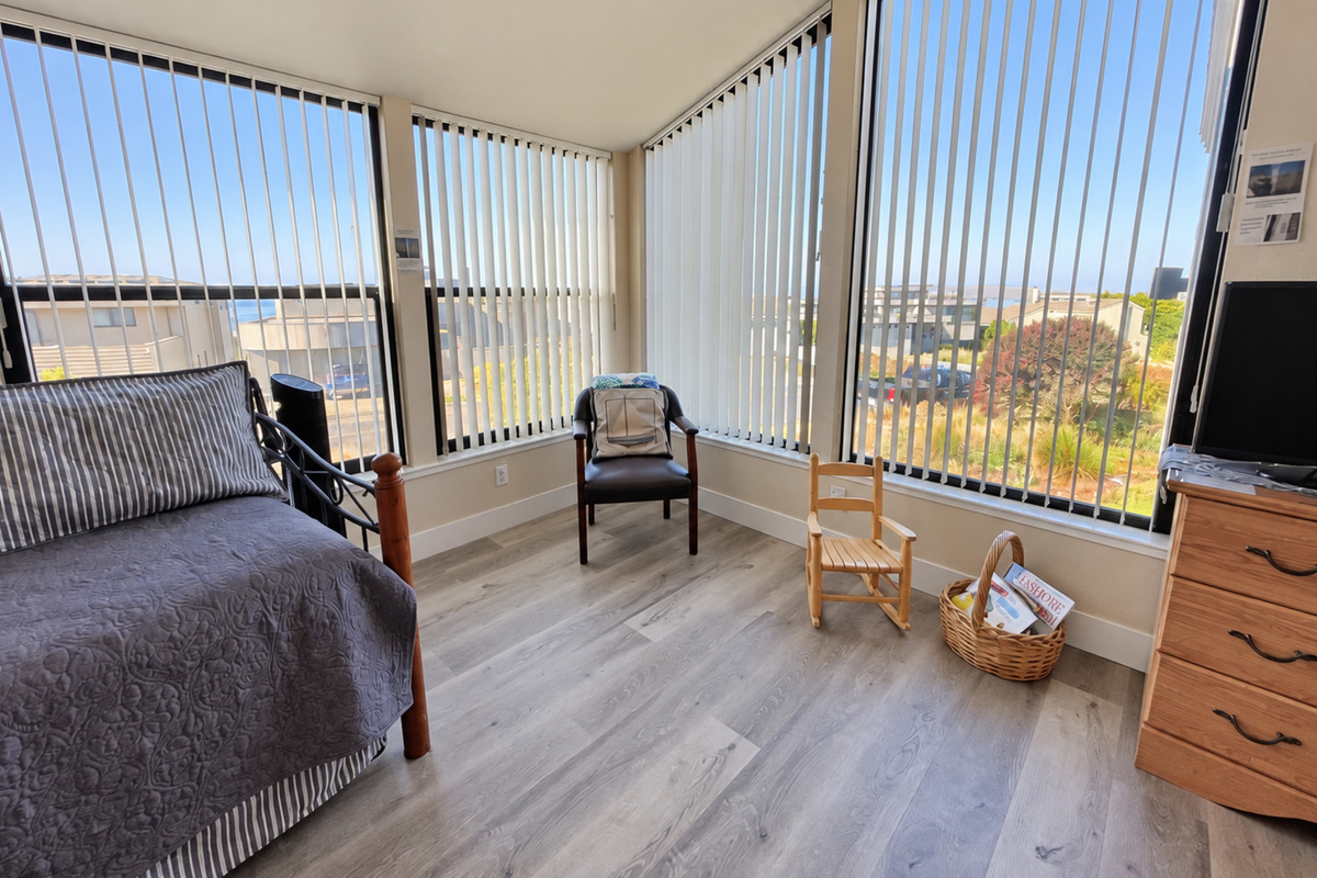 Master Suite large picture windows; child rocker & picture books