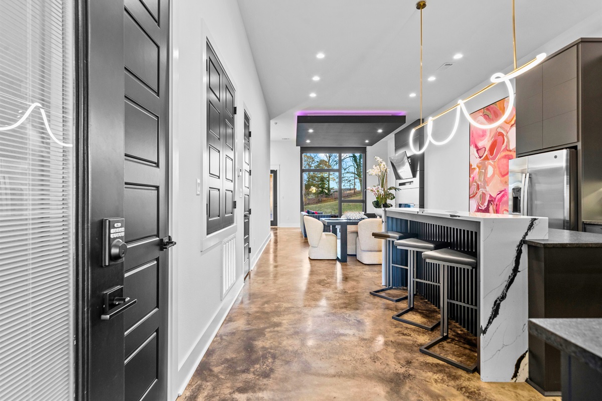 A sleek and welcoming hallway invites you into the heart of the home, setting the tone for modern comfort and effortless style.